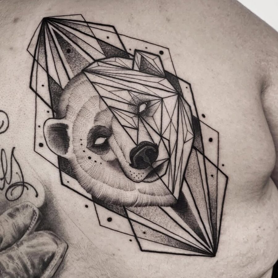 Striking geometric polar bear tattoo design