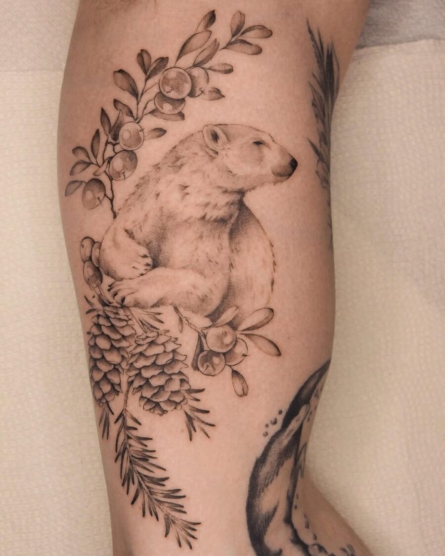 Elegant polar bear tattoo blending with nature
