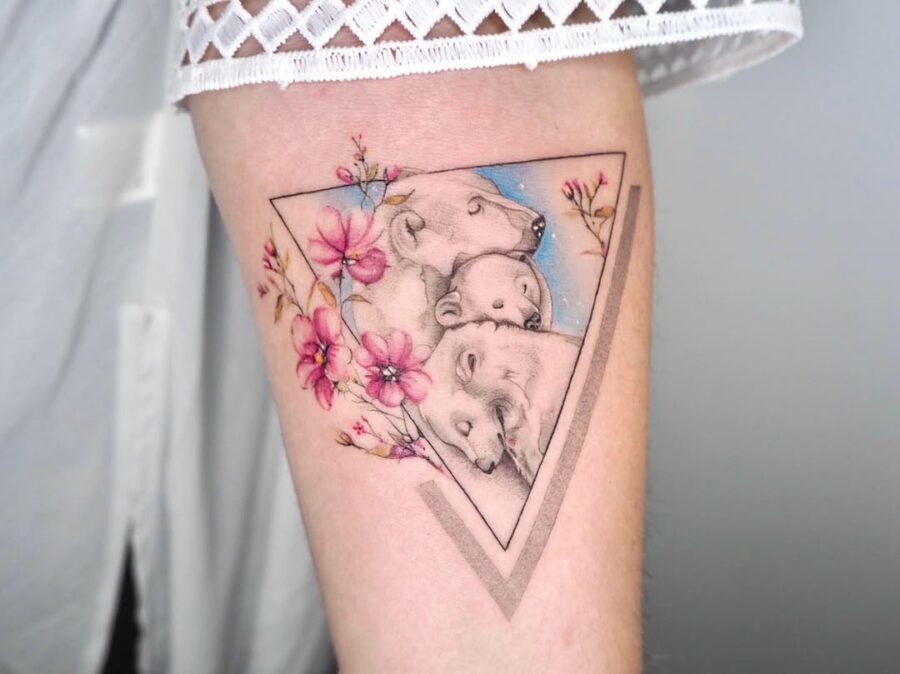 Whimsical Polar Bear Tattoo with Floral Elements