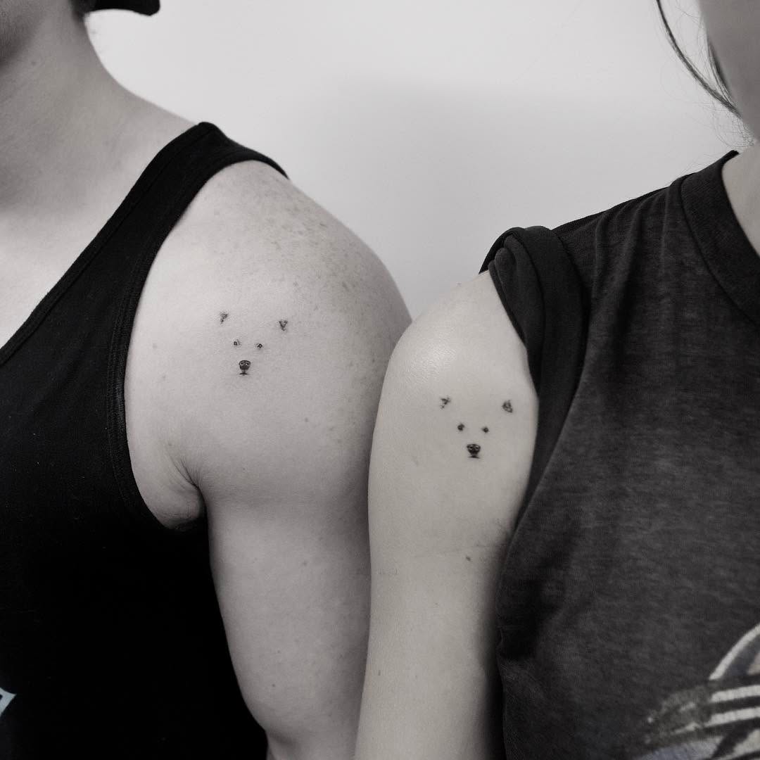 Delightful Couple's Polar Bear Tattoos