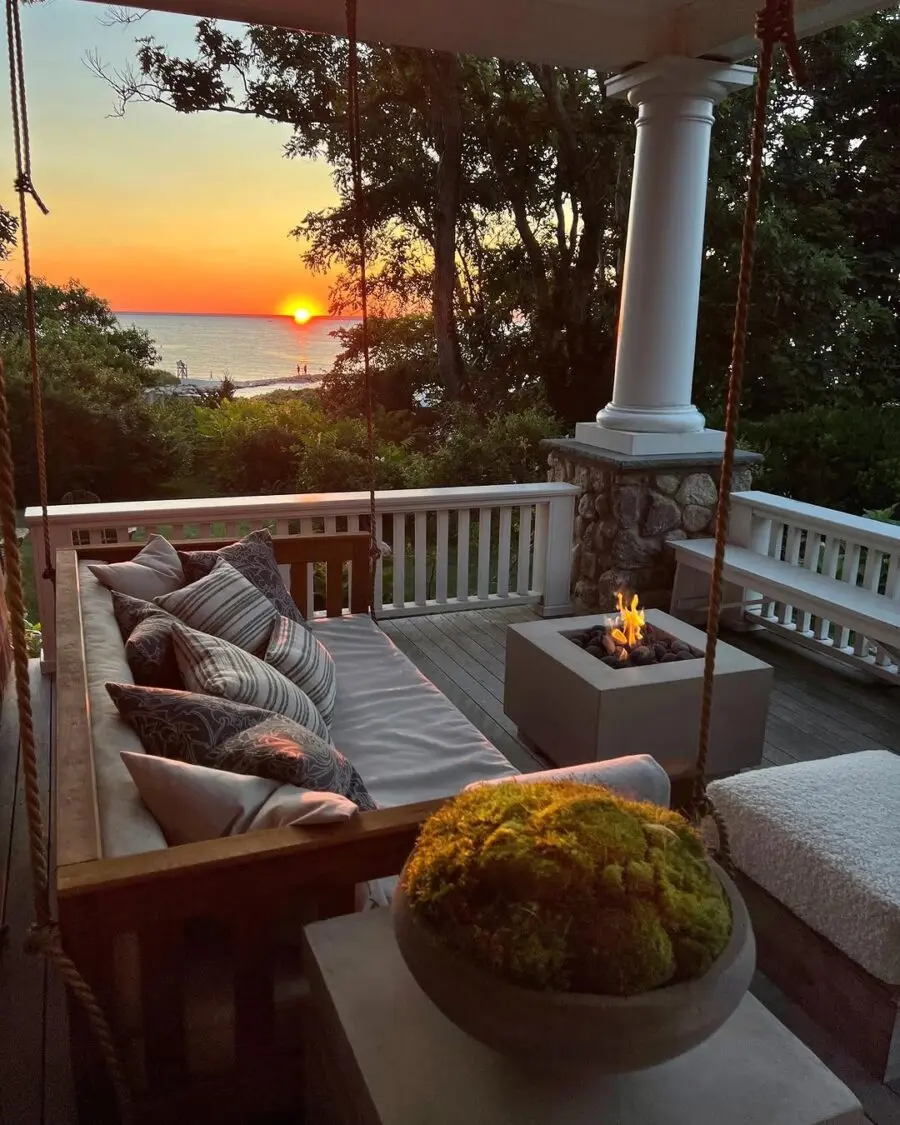 Cozy swing with sunset view and firepit
