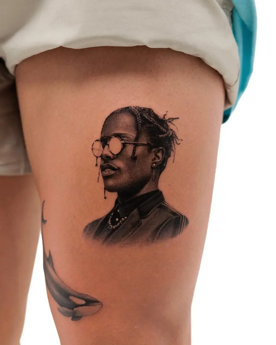 Stunning hyper-realistic portrait tattoo in black
