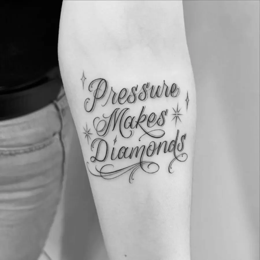 Elegant script tattoo with inspiring message