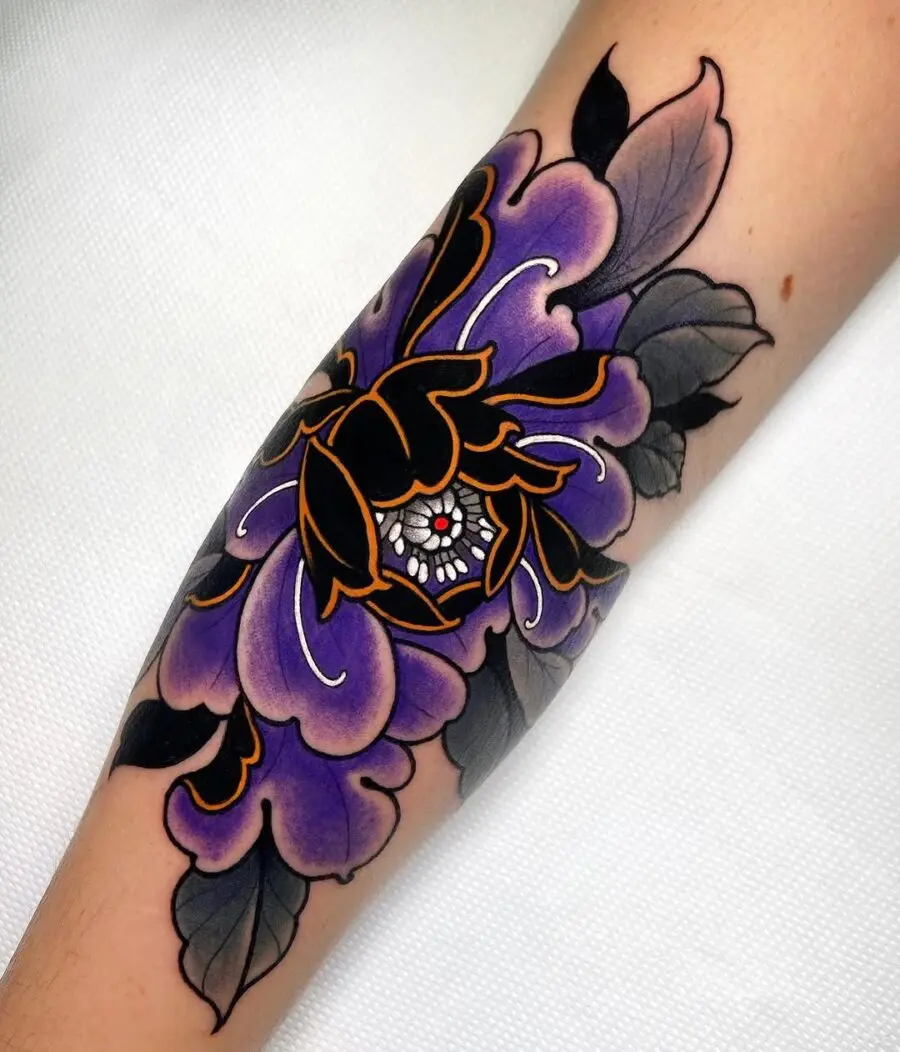 Stunning purple floral tattoo with intricate details