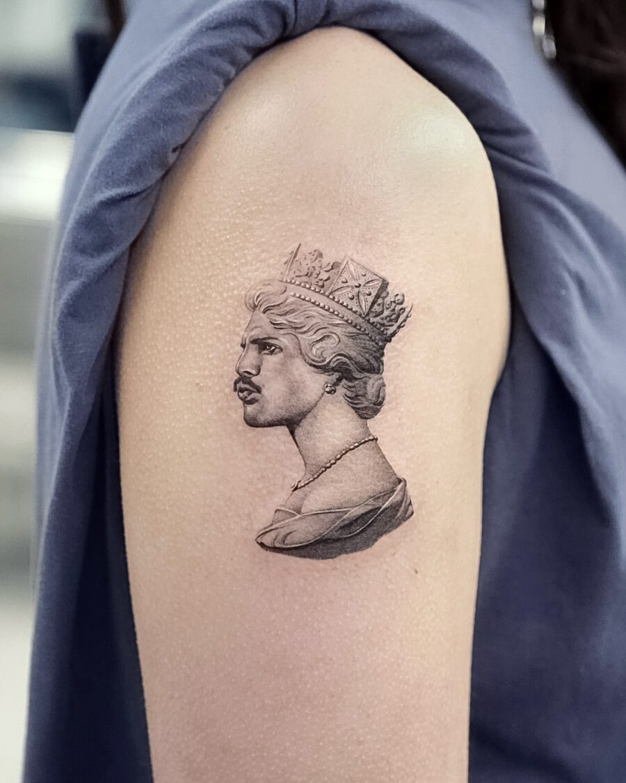 Elegant queen tattoo showcasing stunning realism