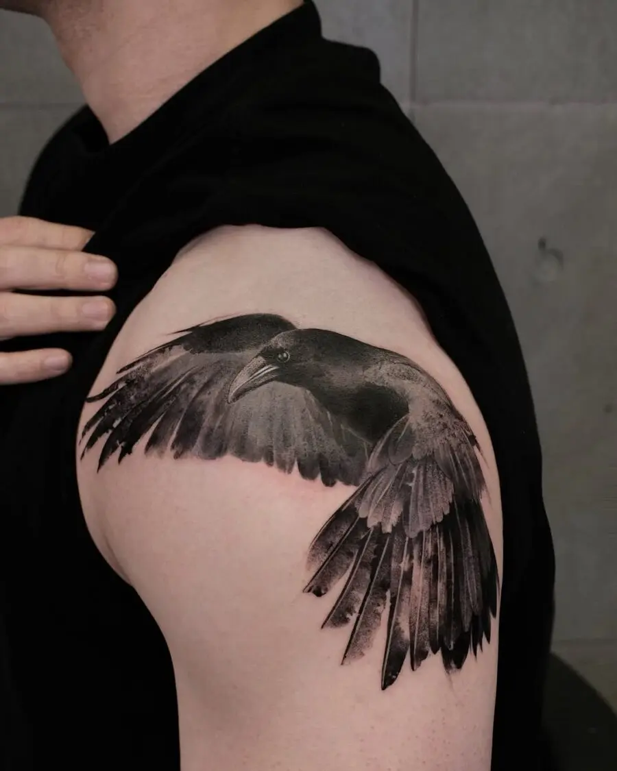 Striking raven tattoo showcasing dynamic wing movement