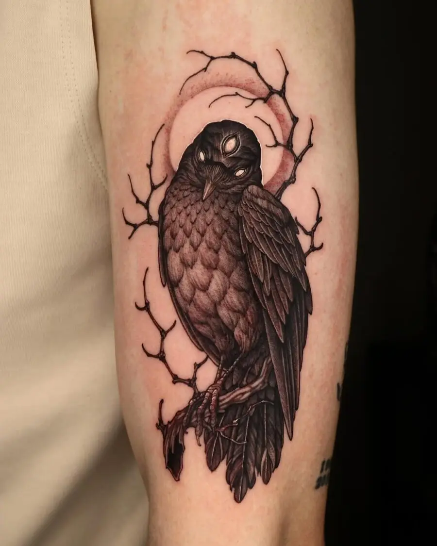 Intricate raven tattoo with ethereal vibes