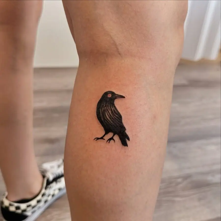 Stylish Raven Tattoo on the Leg