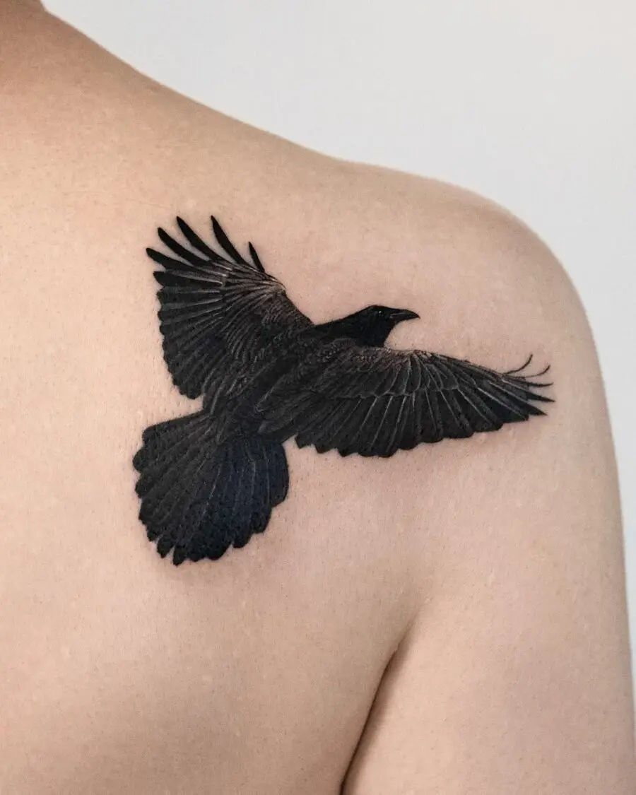 Majestic raven tattoo with spread wings