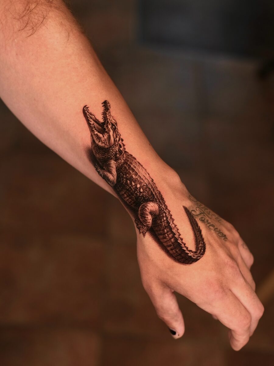 Incredible hyper realistic crocodile tattoo design