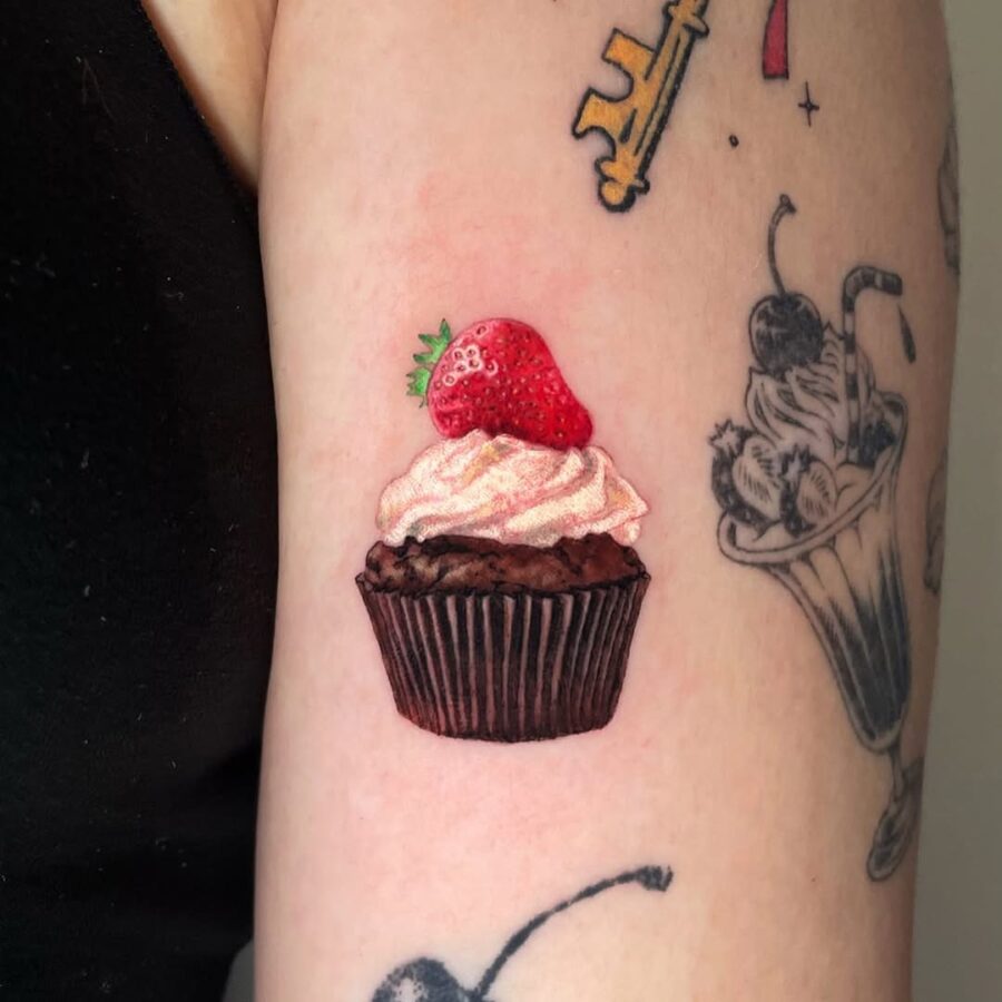 Delightful Cupcake Tattoo with Strawberry Element