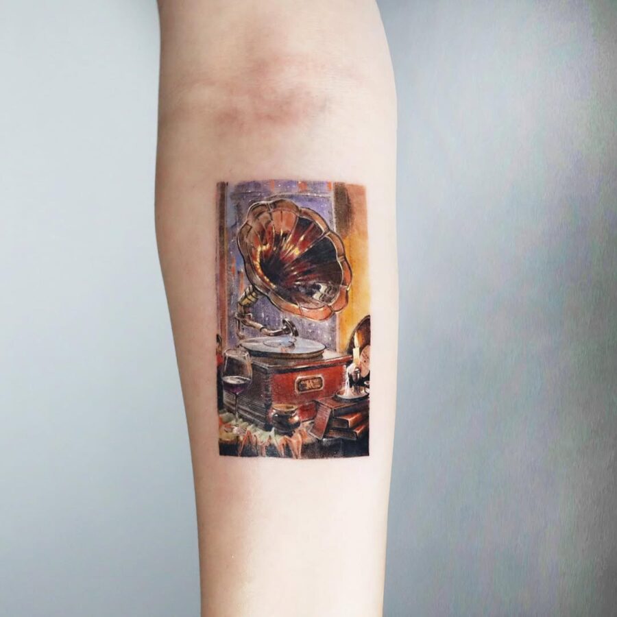 Intricate design of a vintage record player tattoo