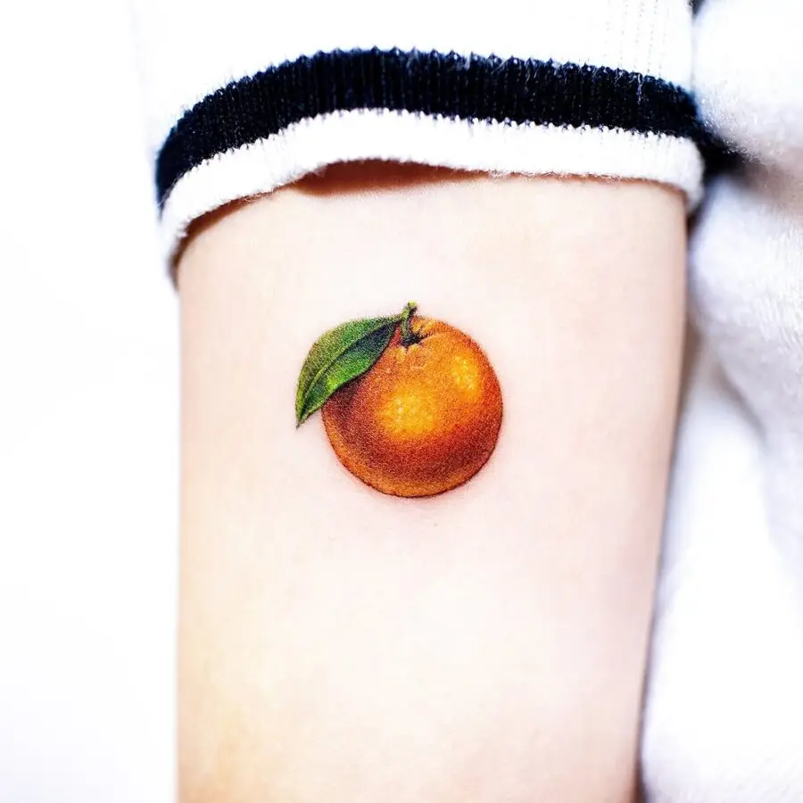 Realistic orange tattoo with vibrant details