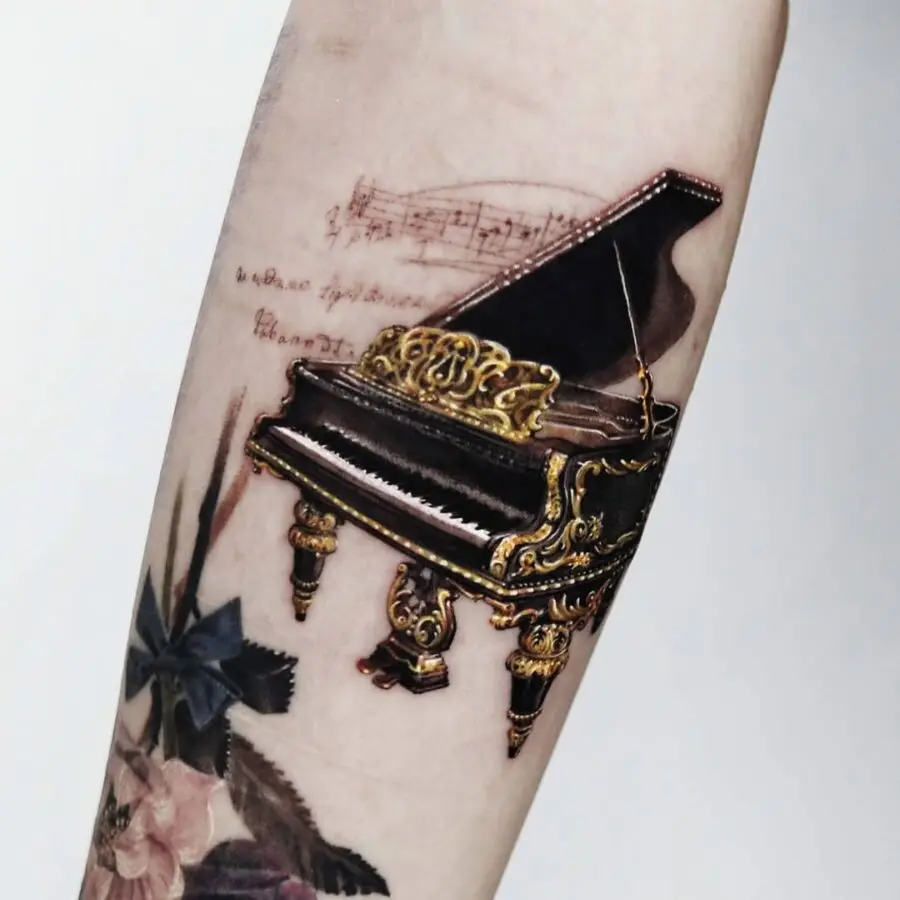 Stunning Detailed Piano Tattoo on Forearm