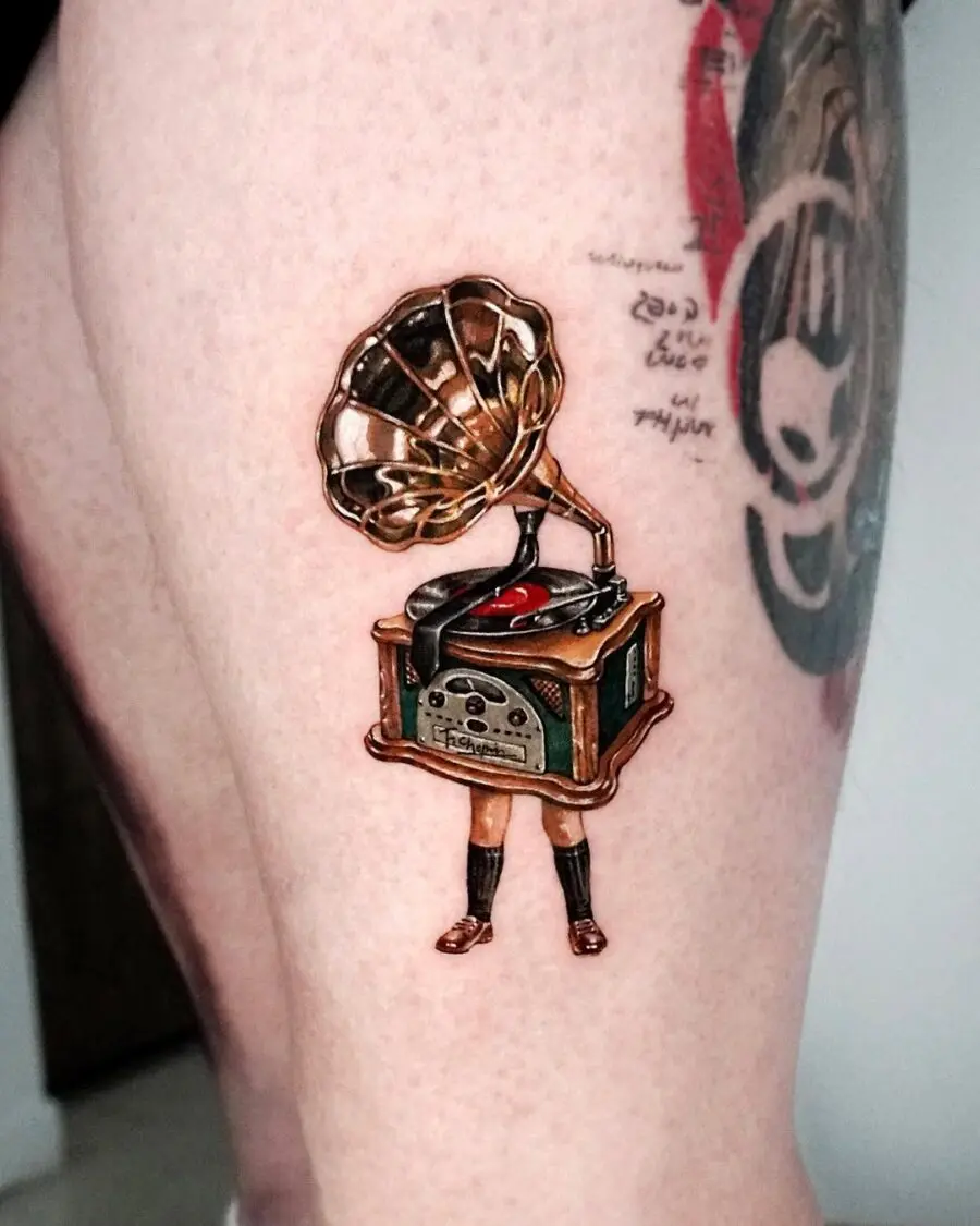 Vintage gramophone tattoo with a creative twist