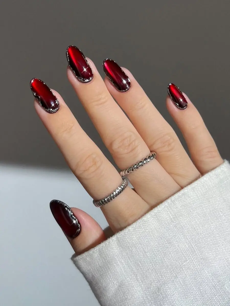 Stylish red velvet nails with edgy details