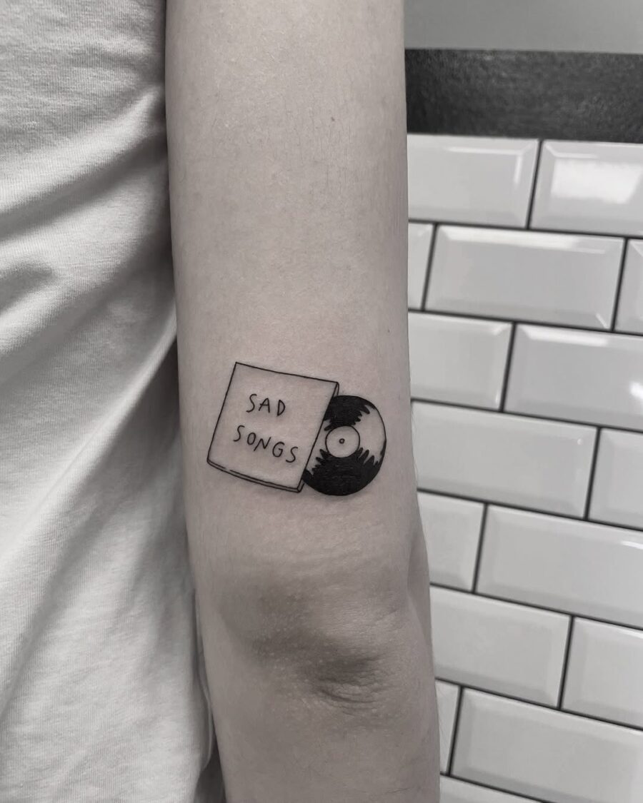 Melancholic vibes captured in tattoo form