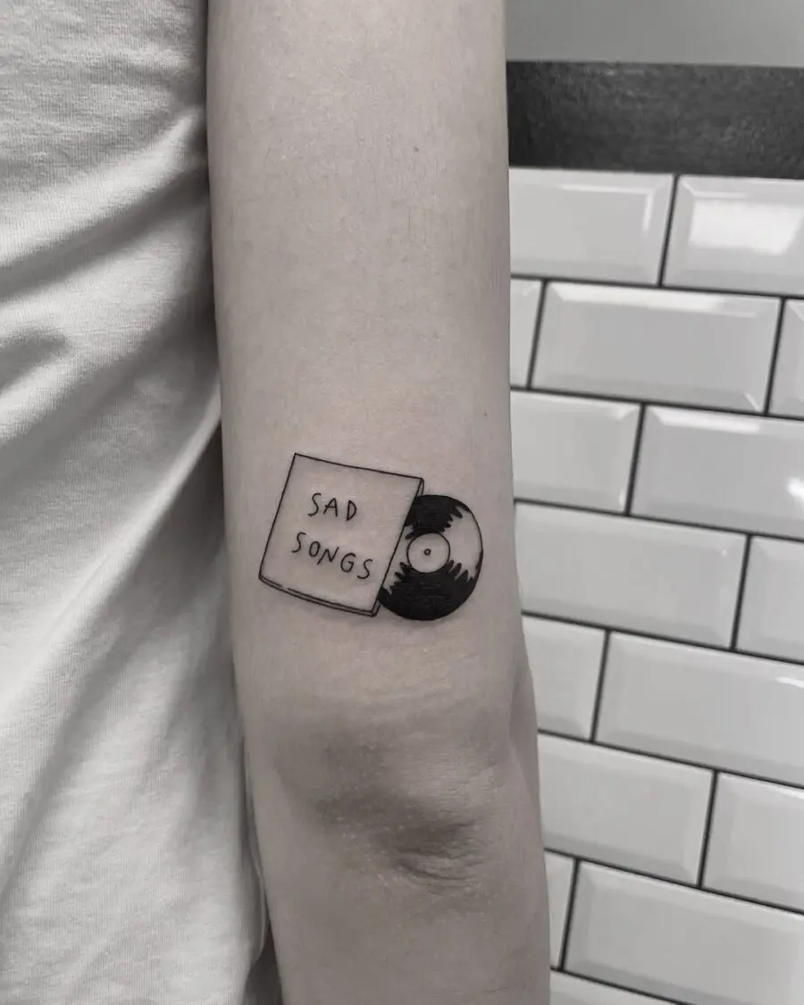 Melancholic vibes captured in tattoo form