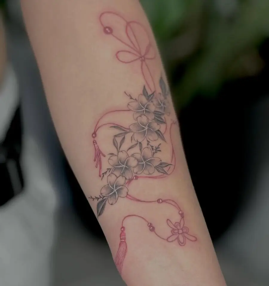 Elegant sampaguita tattoo with artistic detailing