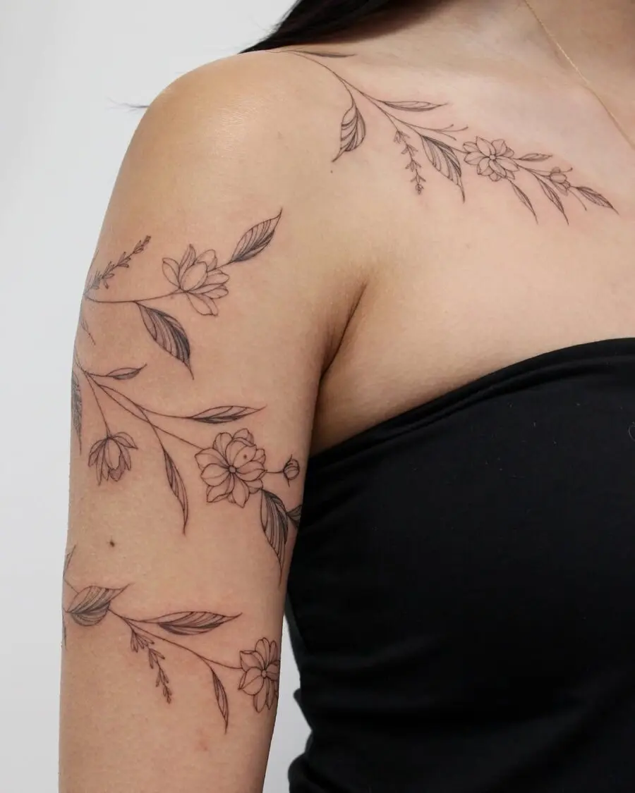 Elegant floral sampaguita tattoo design on shoulder