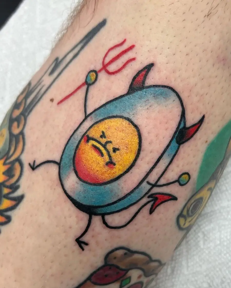 Whimsical egg tattoo with a devilish twist