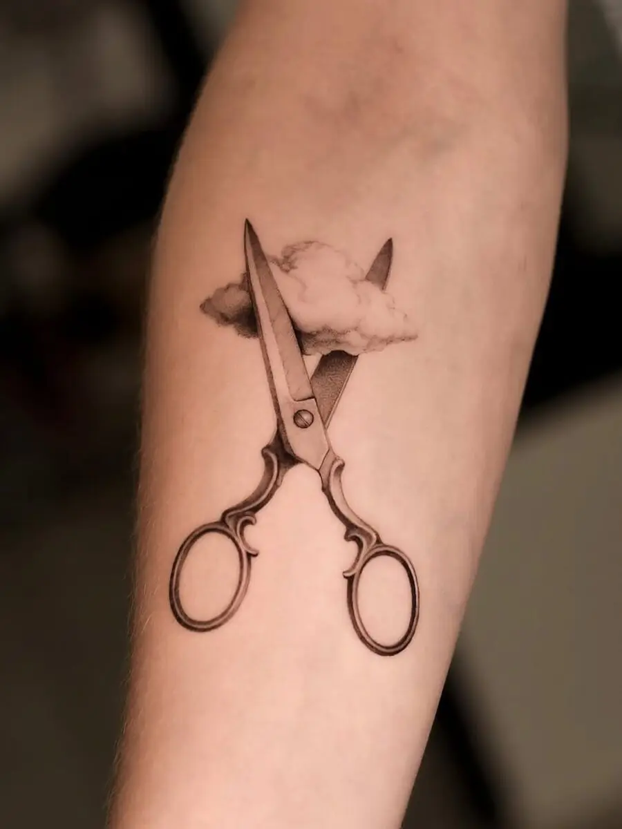 Aesthetic scissors tattoo with cloud detail