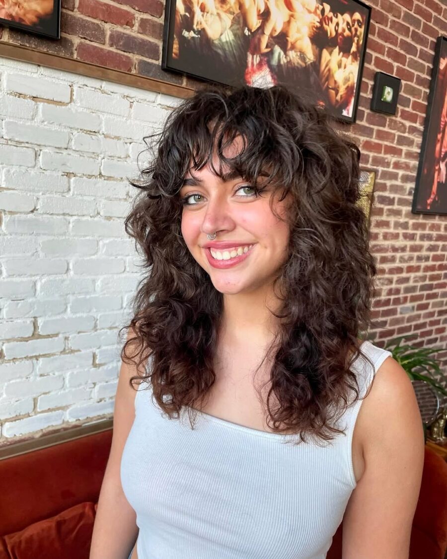 Effortlessly playful short curly shag hairstyle