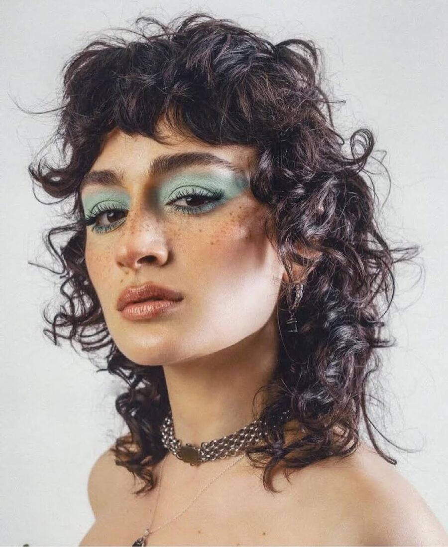 Effortlessly chic short curly shag haircut