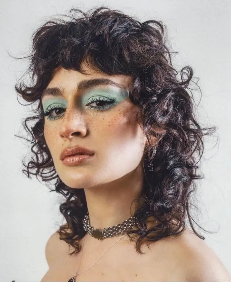 Effortlessly chic short curly shag haircut