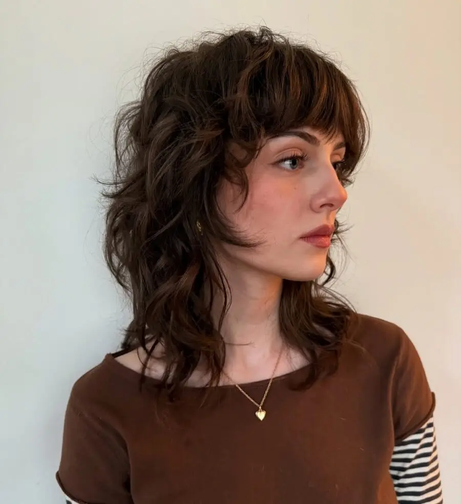 Chic short curly shag with trendy bangs