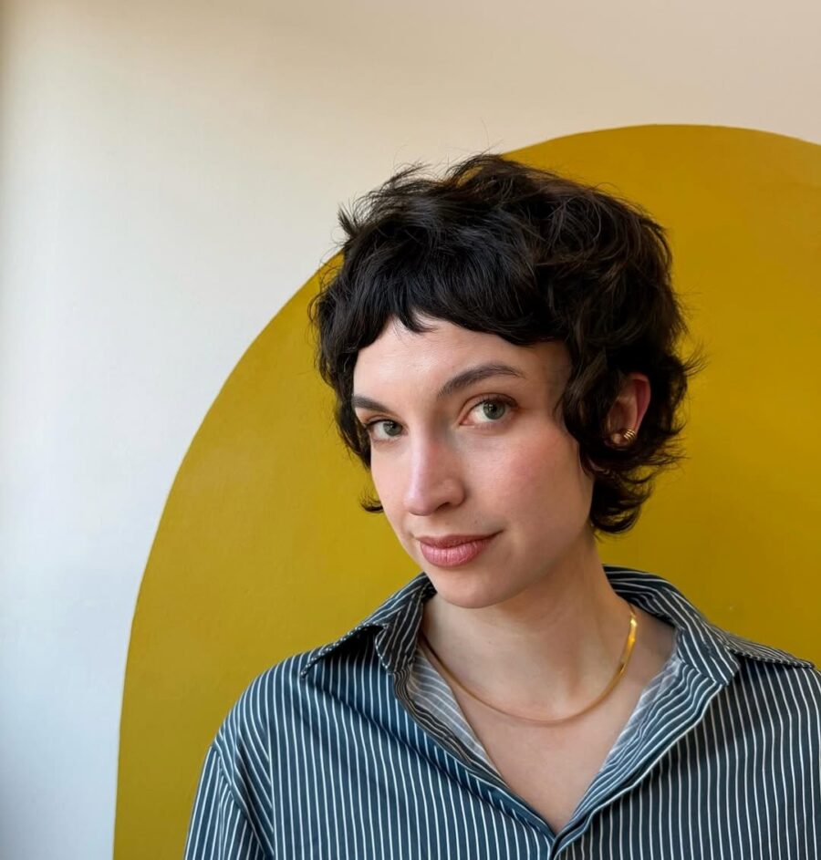 Chic short curly shag hairstyle with modern flair