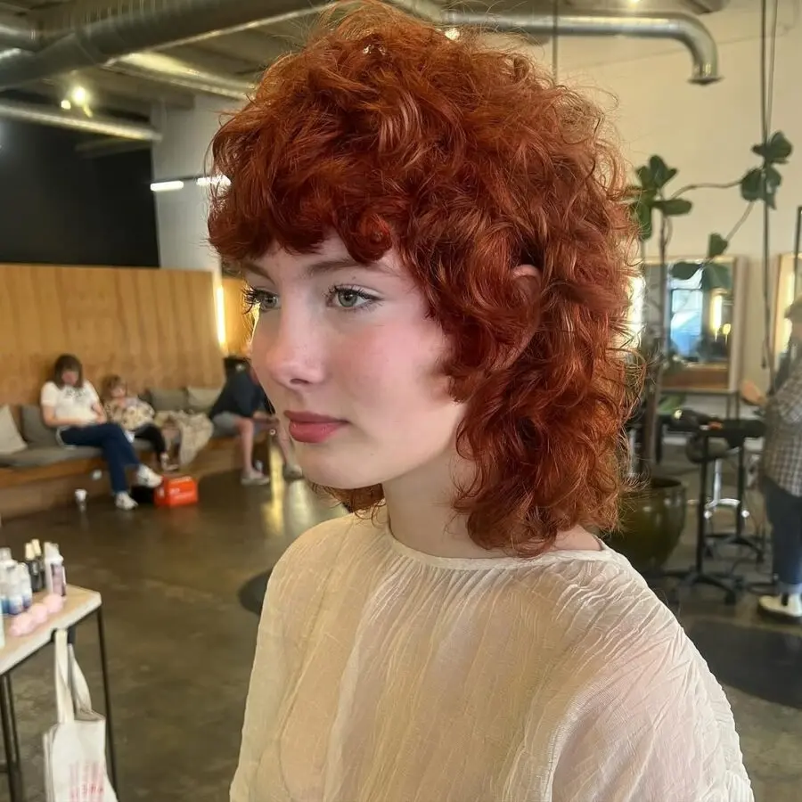 Chic and Vibrant Short Curly Shag Hairstyle