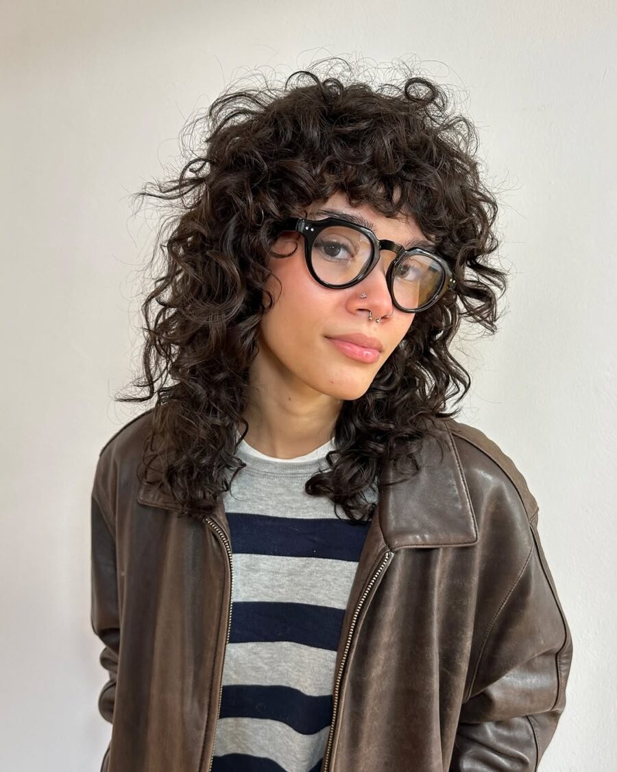 Trendy short curly shag with playful vibes