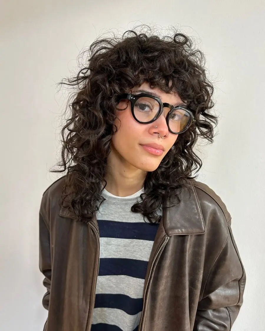 Trendy short curly shag with playful vibes