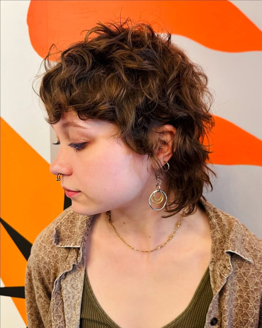 Stylish short curly shag with textured layers