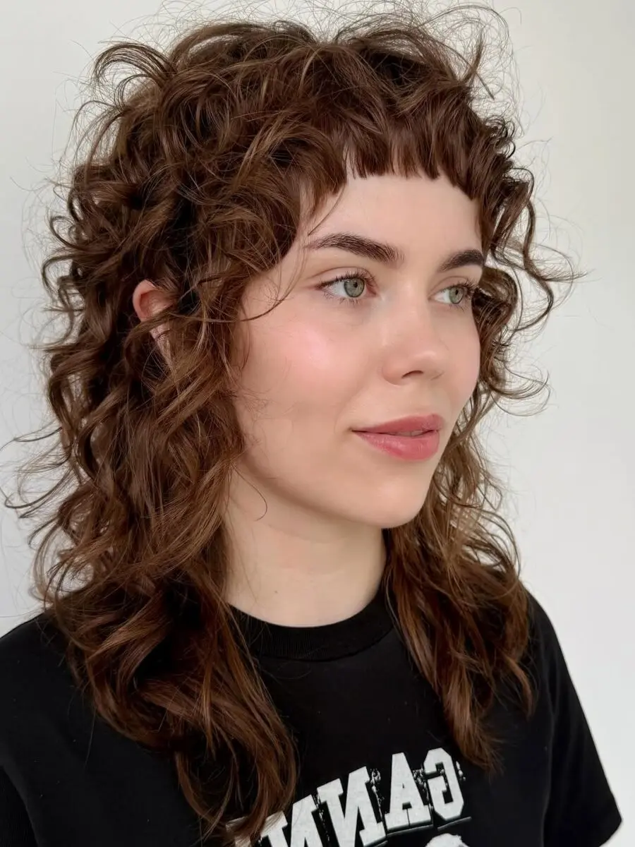 Stylish short curly shag with textured layers
