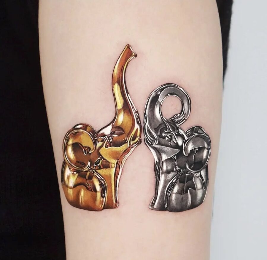 Stunning silver and gold ink tattoo design