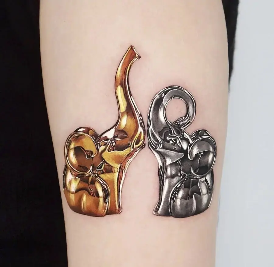 Stunning silver and gold ink tattoo design