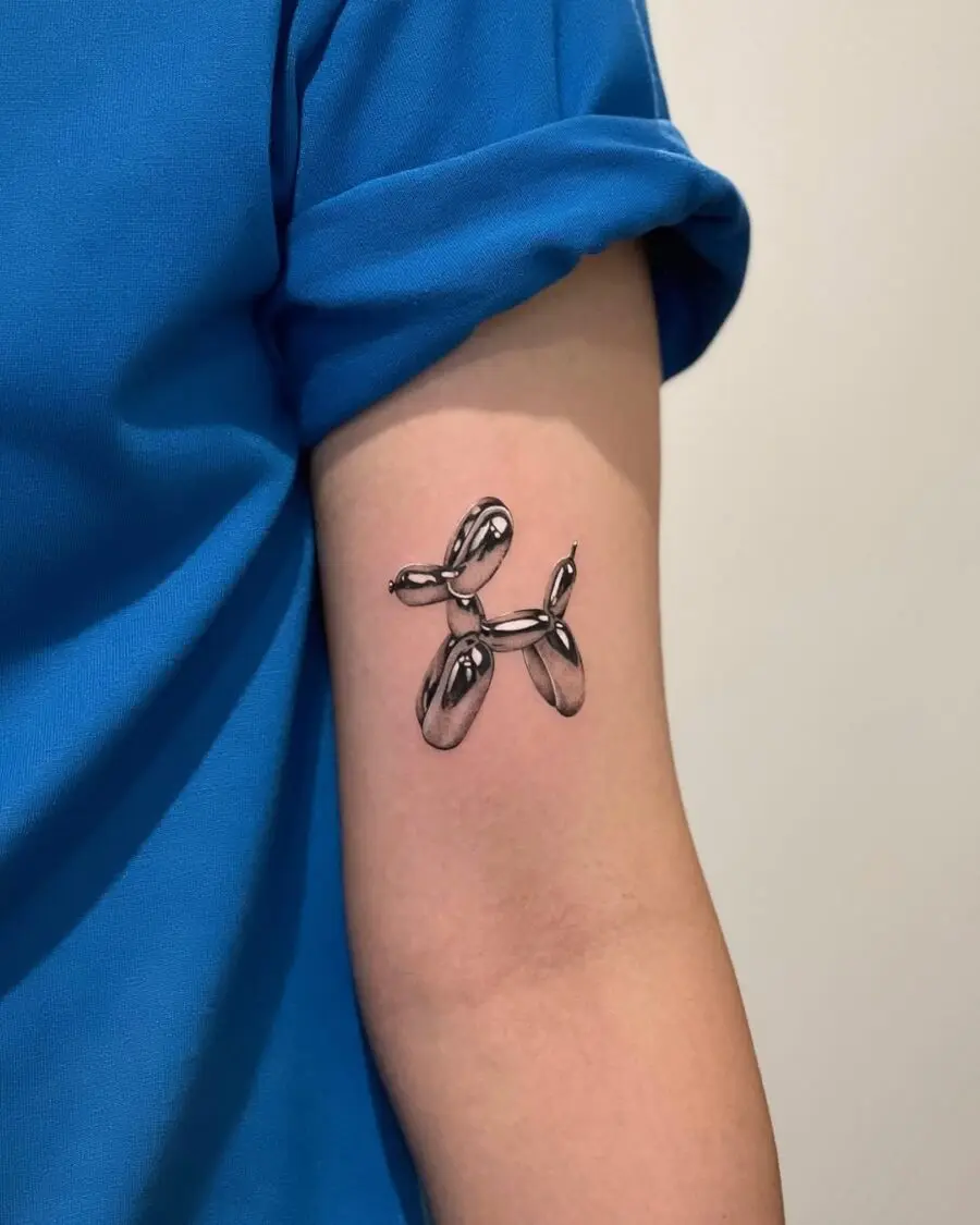 Unique silver ink balloon tattoo on arm