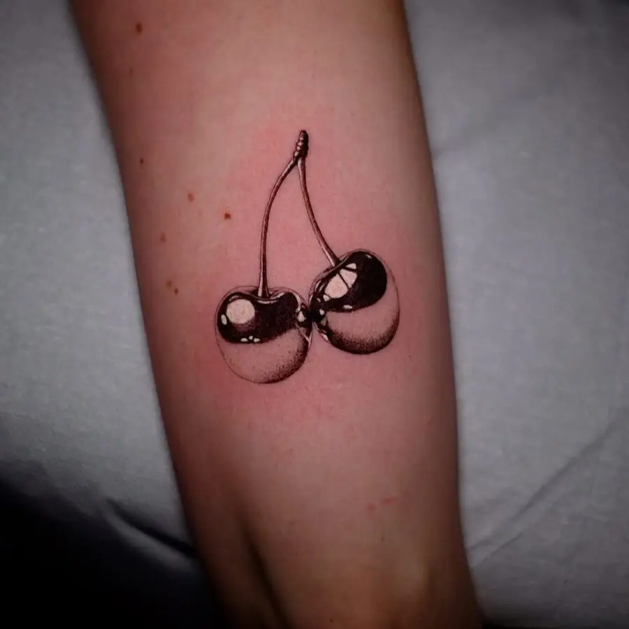 Stunning silver ink cherry tattoo design