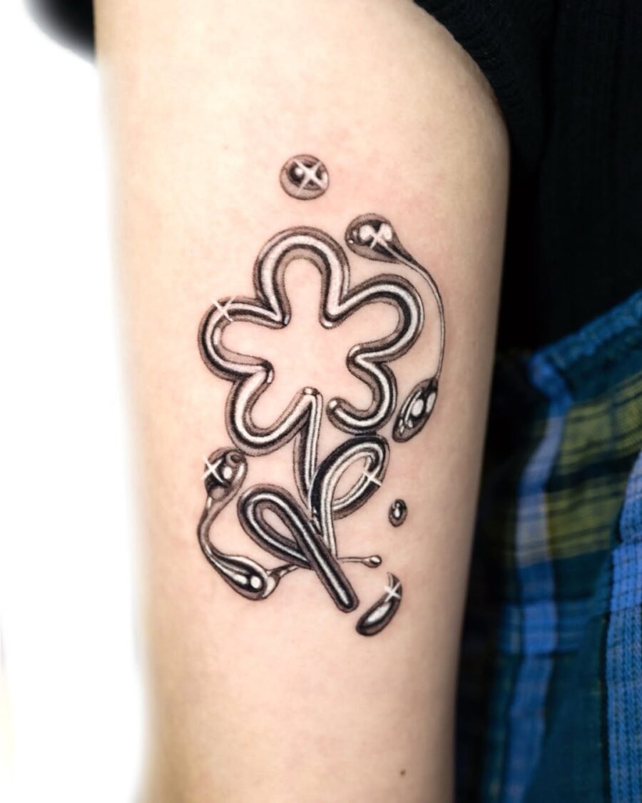 Unique silver ink flower tattoo design