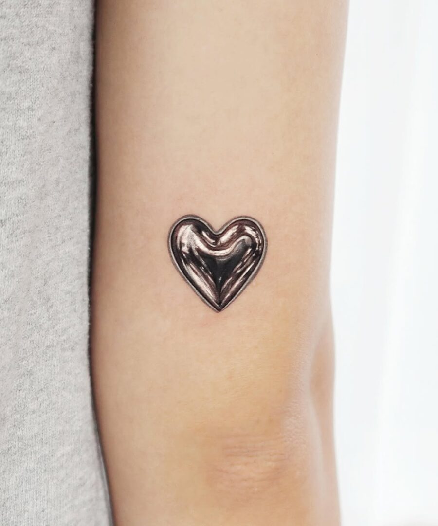 Unique Heart Tattoo in Shiny Silver Ink