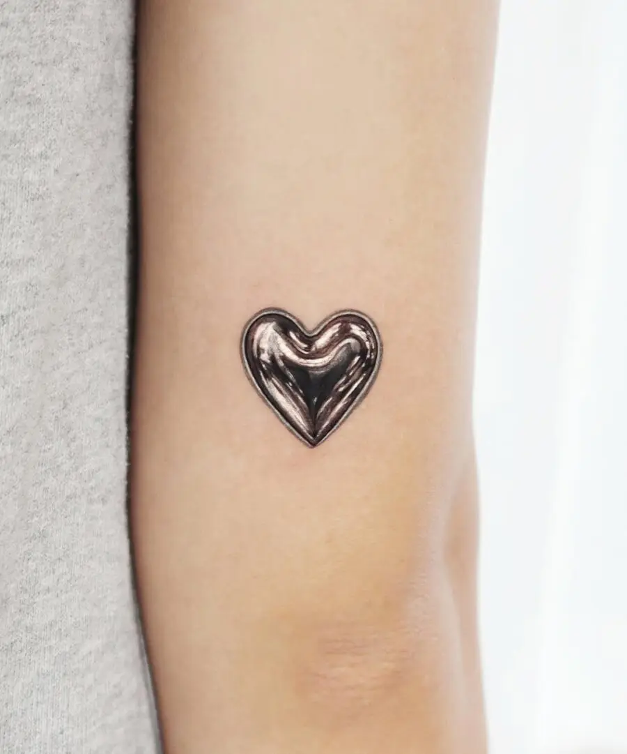 Unique Heart Tattoo in Shiny Silver Ink