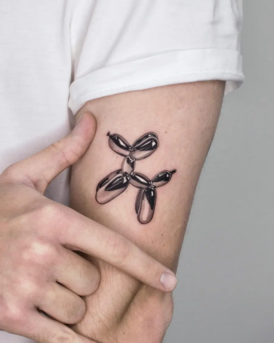 Unique silver ink balloon dog tattoo design