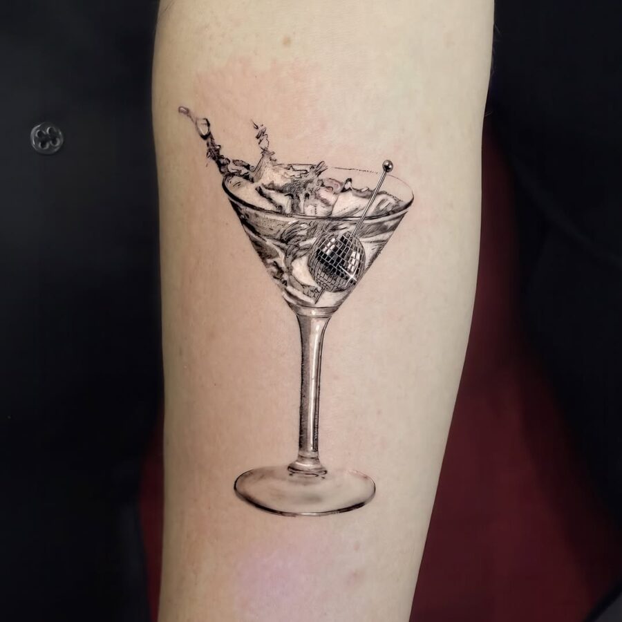 Stunning cocktail glass silver ink tattoo