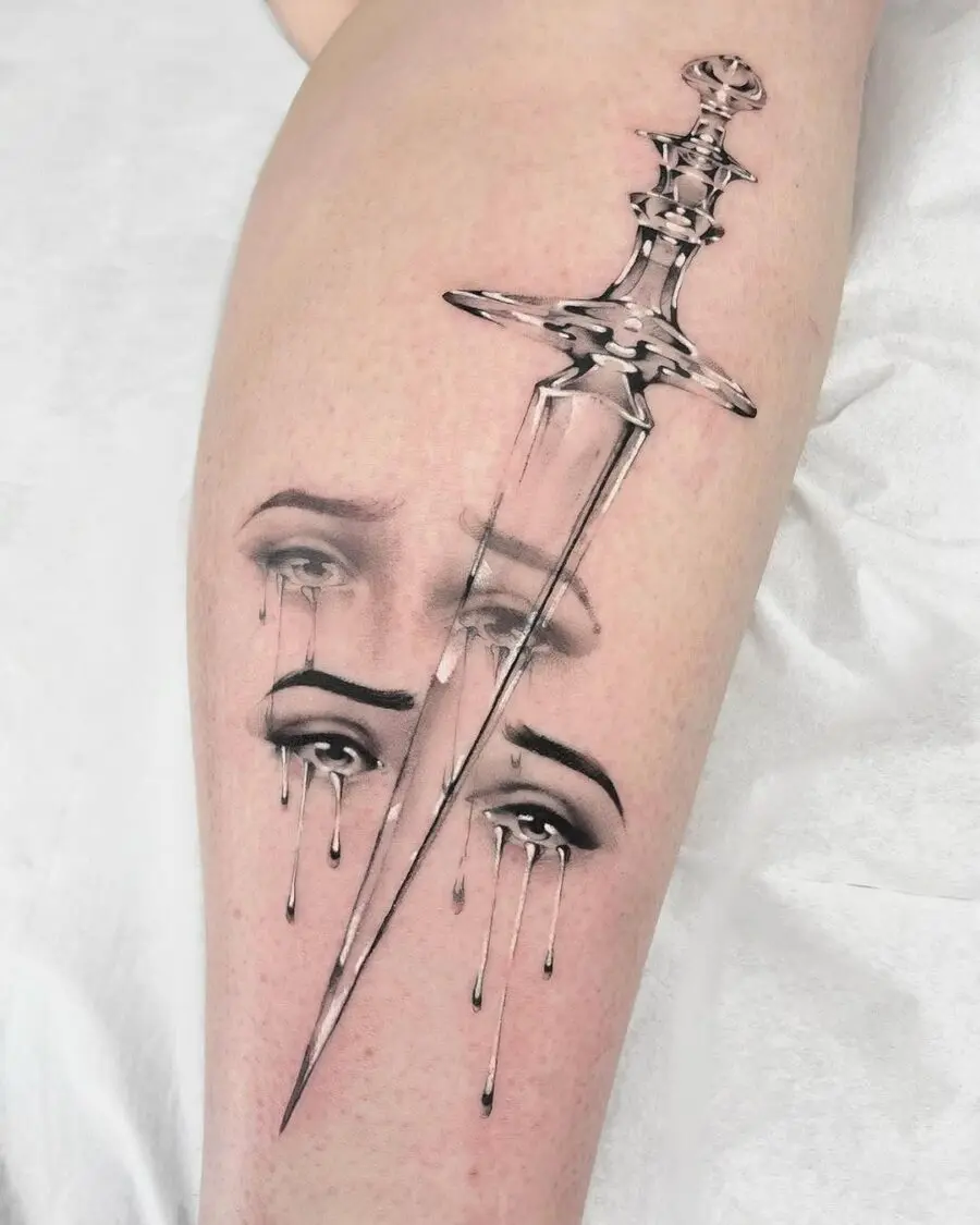 Intricate dagger tattoo with emotional expressions