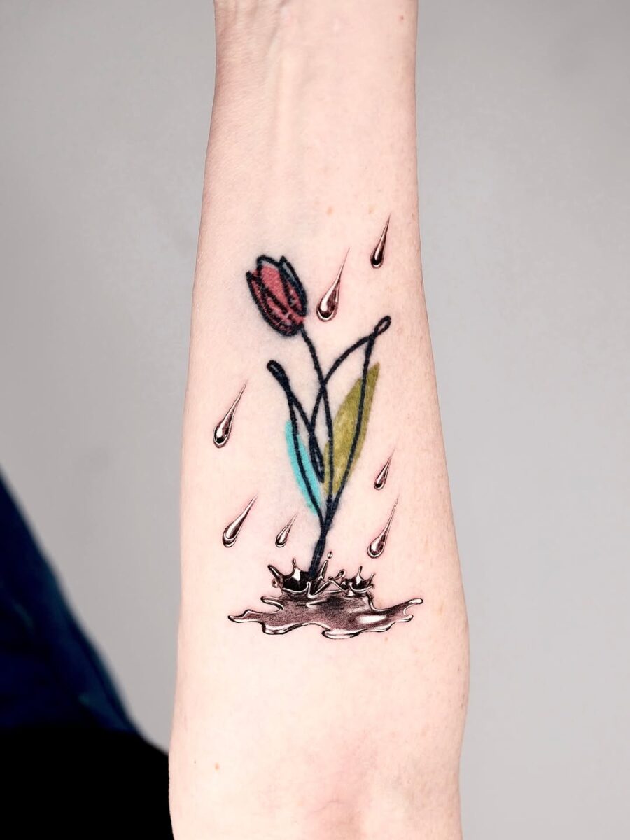 Unique silver ink floral tattoo with water elements