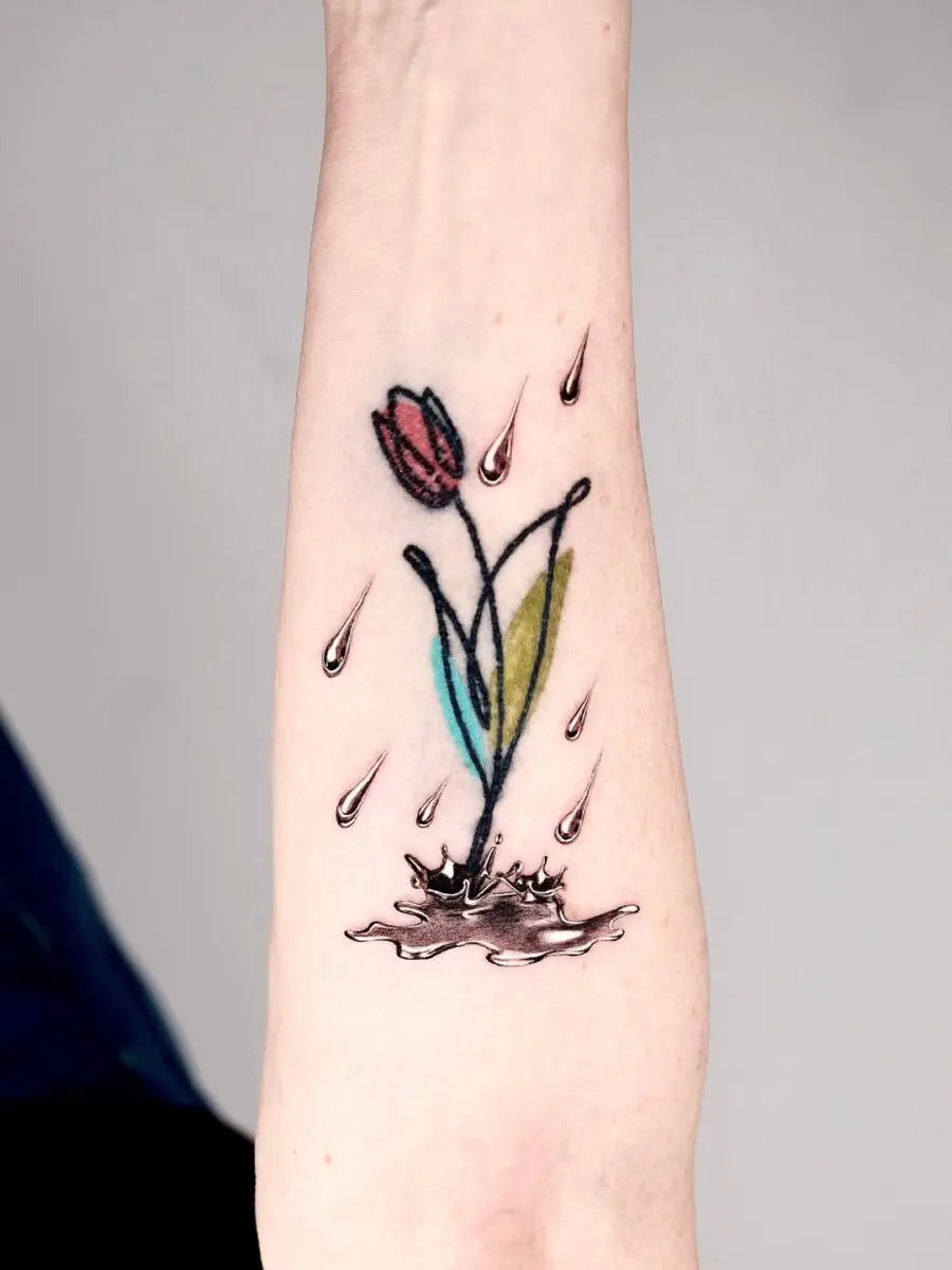 Unique silver ink floral tattoo with water elements