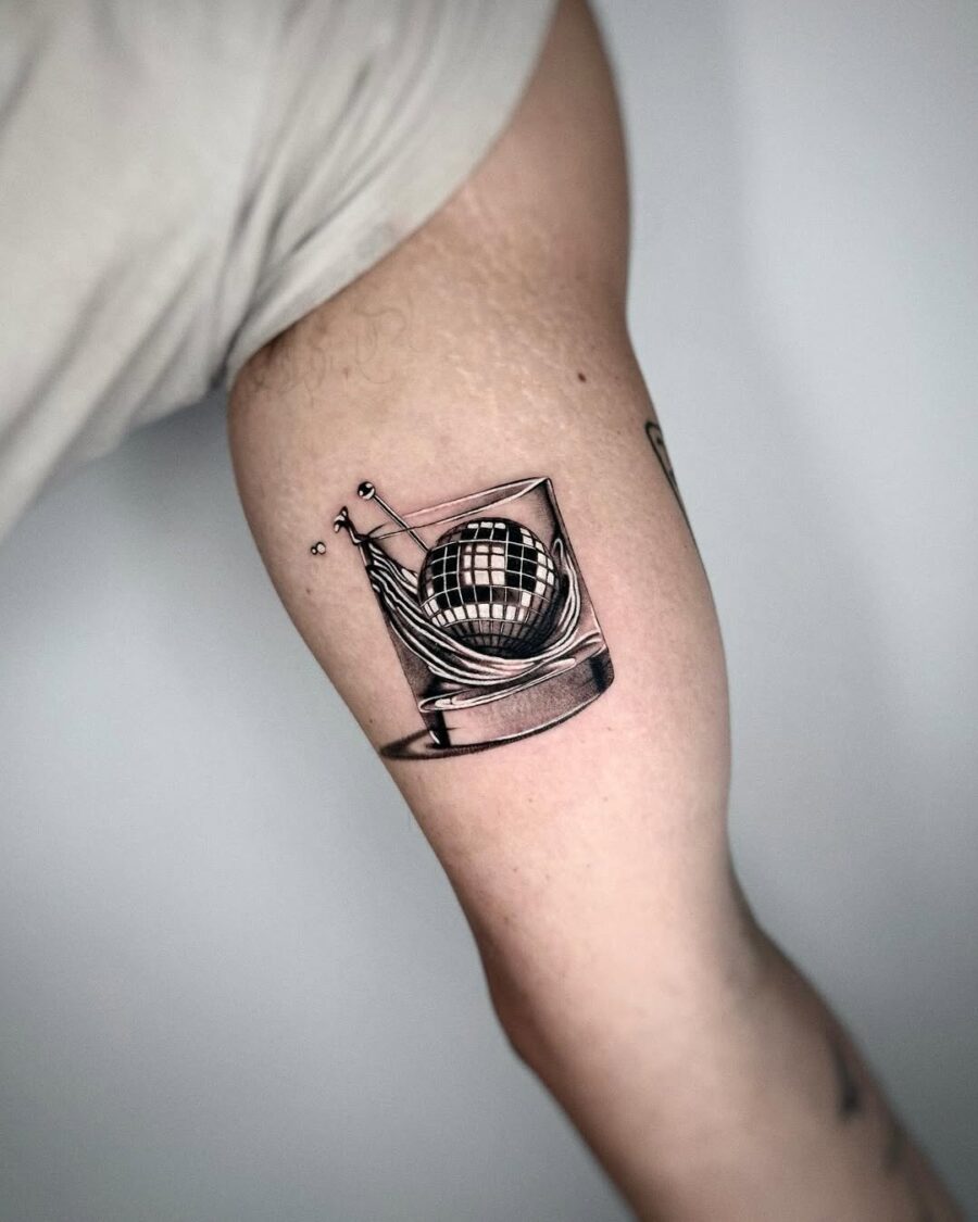 Distinctive Silver Ink Tattoo of a Splashing Glass