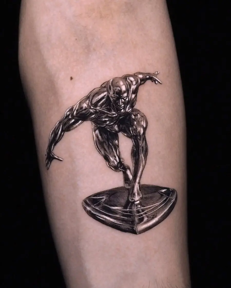 Dynamic silver ink tattoo of a skateboarder